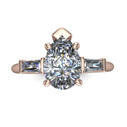 Jade pear three stone engagement ring in 14K Rose Gold with tapered baguette side stones, top-down view of the center stone and tapered baguette side stones