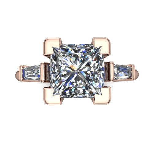 Jade princess three stone engagement ring in 18K Rose Gold with tapered baguette side stones, top-down view of the center stone and tapered baguette side stones