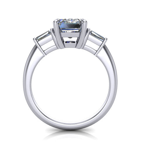 Jade emerald three stone engagement ring in Platinum with tapered baguette side stones, through-finger front profile