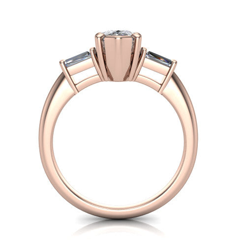 Jade pear three stone engagement ring in 14K Rose Gold with tapered baguette side stones, through-finger front profile