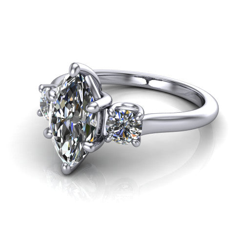 Emma marquise three stone engagement ring in 18K White Gold, three-quarter perspective showing the center diamond between two round side stones on a slim polished band
