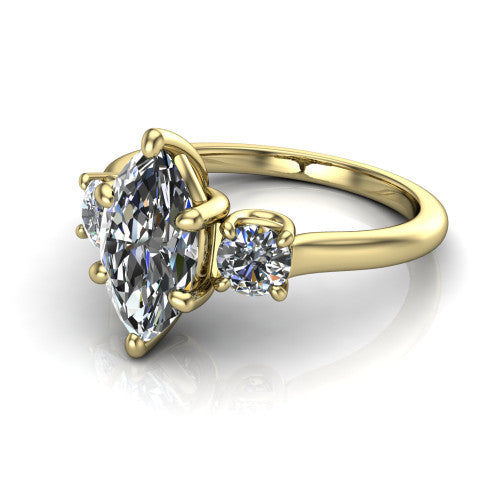 Emma marquise three stone engagement ring in 14K Yellow Gold, three-quarter perspective showing the center diamond between two round side stones on a slim polished band