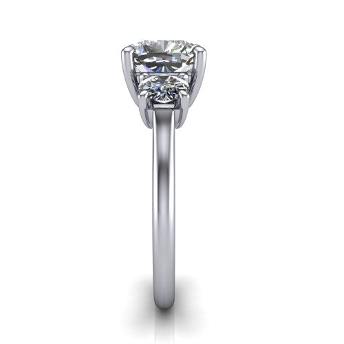 Emma cushion three stone engagement ring in 14K White Gold, side profile showing the round side stone and the smooth tapered polished band