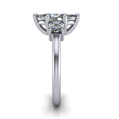 Emma marquise three stone engagement ring in 14K White Gold, side profile showing the round side stone and the smooth tapered polished band