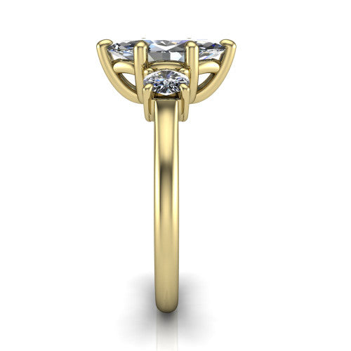 Emma marquise three stone engagement ring in 14K Yellow Gold, side profile showing the round side stone and the smooth tapered polished band
