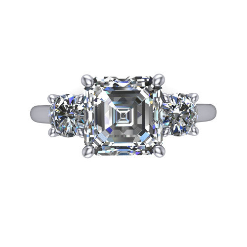 Emma asscher three stone engagement ring in Platinum, top-down view showing the center diamond flanked by two round side stones in a classic three stone setting