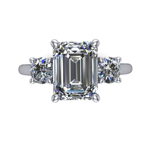 Emma emerald three stone engagement ring in 14K White Gold, top-down view showing the center diamond flanked by two round side stones in a classic three stone setting