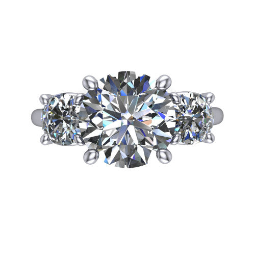 Emma round three stone engagement ring in 18K White Gold, top-down view showing the center diamond flanked by two round side stones in a classic three stone setting
