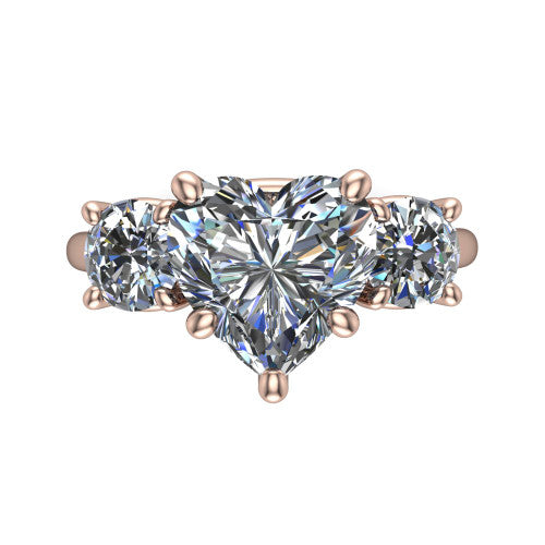 Emma heart three stone engagement ring in 14K Rose Gold, top-down view showing the center diamond flanked by two round side stones in a classic three stone setting