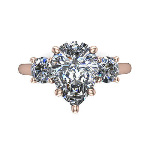 Emma pear three stone engagement ring in 14K Rose Gold, top-down view showing the center diamond flanked by two round side stones in a classic three stone setting