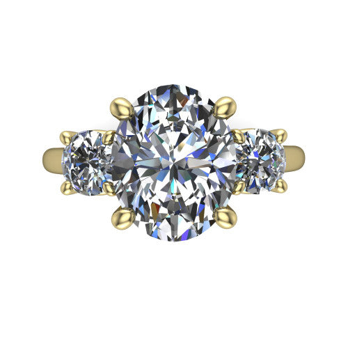 Emma oval three stone engagement ring in 14K Yellow Gold, top-down view showing the center diamond flanked by two round side stones in a classic three stone setting