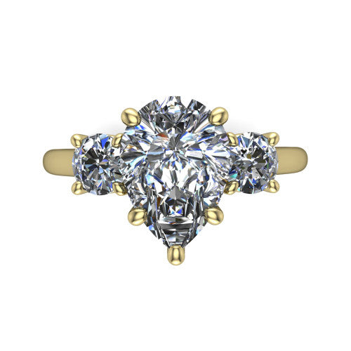 Emma pear three stone engagement ring in 18K Yellow Gold, top-down view showing the center diamond flanked by two round side stones in a classic three stone setting