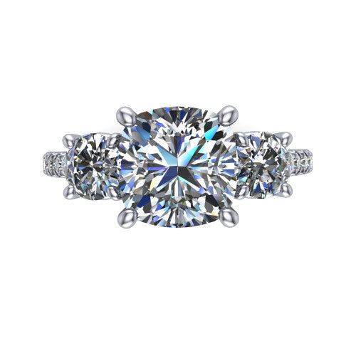 Celeste cushion three stone engagement ring in 18K White Gold, top-down view showing the center diamond flanked by two round side stones in a classic three stone setting
