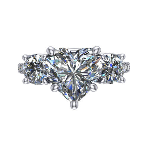 Celeste heart three stone engagement ring in 14K White Gold, top-down view showing the center diamond flanked by two round side stones in a classic three stone setting