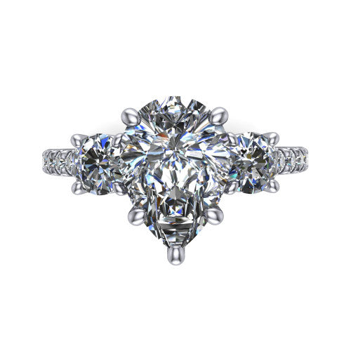 Celeste pear three stone engagement ring in Platinum, top-down view showing the center diamond flanked by two round side stones in a classic three stone setting