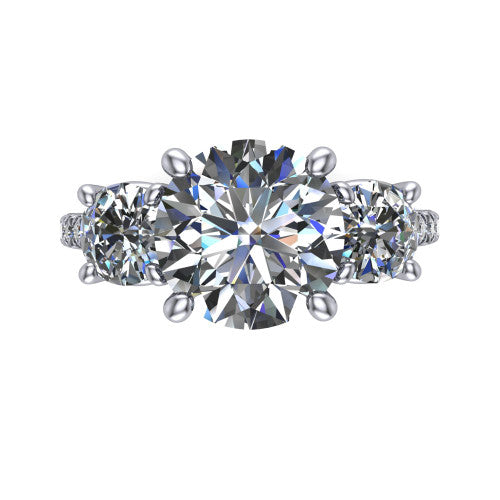 Celeste round three stone engagement ring in 18K White Gold, top-down view showing the center diamond flanked by two round side stones in a classic three stone setting