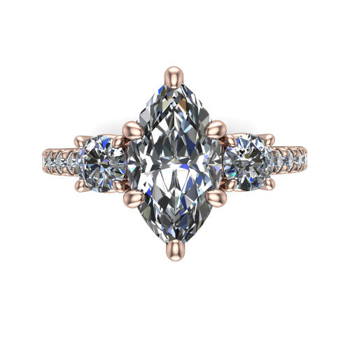 Celeste marquise three stone engagement ring in 18K Rose Gold, top-down view showing the center diamond flanked by two round side stones in a classic three stone setting