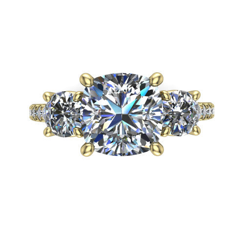 Celeste cushion three stone engagement ring in 18K Yellow Gold, top-down view showing the center diamond flanked by two round side stones in a classic three stone setting