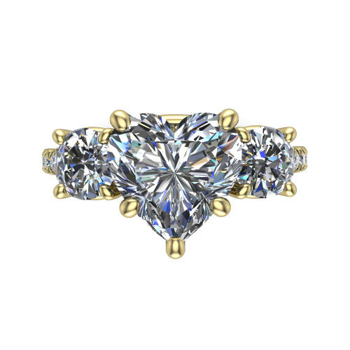 Celeste heart three stone engagement ring in 14K Yellow Gold, top-down view showing the center diamond flanked by two round side stones in a classic three stone setting