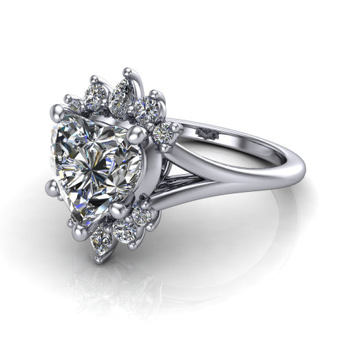Sage heart halo engagement ring in 18K White Gold, three-quarter perspective showing the center framed by a vintage cluster halo of pear and round diamonds above a split shank