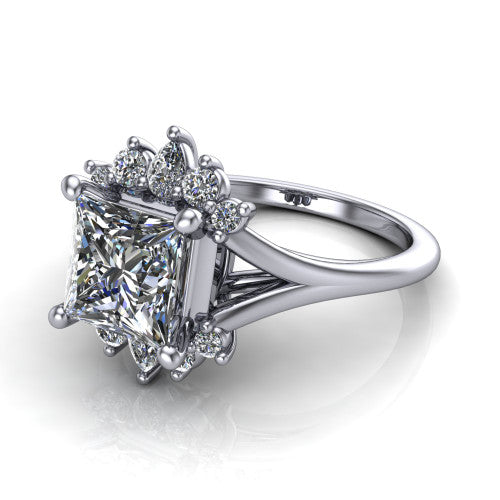 Sage princess halo engagement ring in 18K White Gold, three-quarter perspective showing the center framed by a vintage cluster halo of pear and round diamonds above a split shank