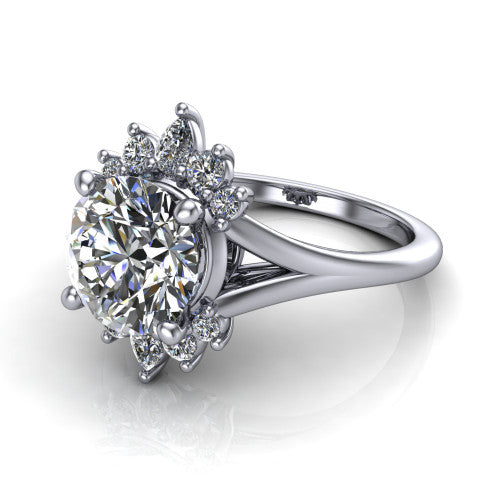 Sage round halo engagement ring in Platinum, three-quarter perspective showing the center framed by a vintage cluster halo of pear and round diamonds above a split shank