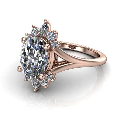 Sage oval halo engagement ring in 14K Rose Gold, three-quarter perspective showing the center framed by a vintage cluster halo of pear and round diamonds above a split shank