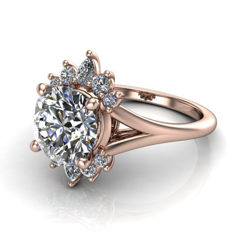 Sage round halo engagement ring in 18K Rose Gold, three-quarter perspective showing the center framed by a vintage cluster halo of pear and round diamonds above a split shank
