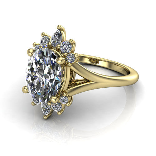 Sage oval halo engagement ring in 14K Yellow Gold, three-quarter perspective showing the center framed by a vintage cluster halo of pear and round diamonds above a split shank