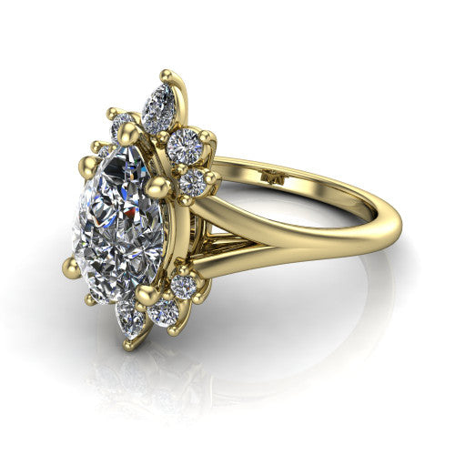 Sage pear halo engagement ring in 18K Yellow Gold, three-quarter perspective showing the center framed by a vintage cluster halo of pear and round diamonds above a split shank
