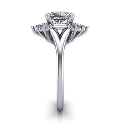 Sage cushion halo engagement ring in Platinum, side profile showing the pear and round accent cluster and the polished split band