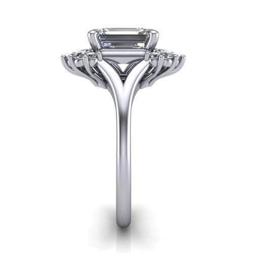 Sage emerald halo engagement ring in Platinum, side profile showing the pear and round accent cluster and the polished split band