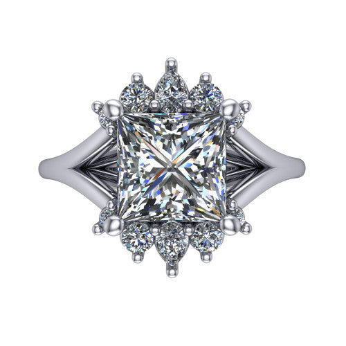 Sage princess halo engagement ring in 18K White Gold, top-down view showing the center diamond ringed by a ballerina halo of pear and round accent diamonds