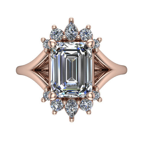 Sage emerald halo engagement ring in 18K Rose Gold, top-down view showing the center diamond ringed by a ballerina halo of pear and round accent diamonds