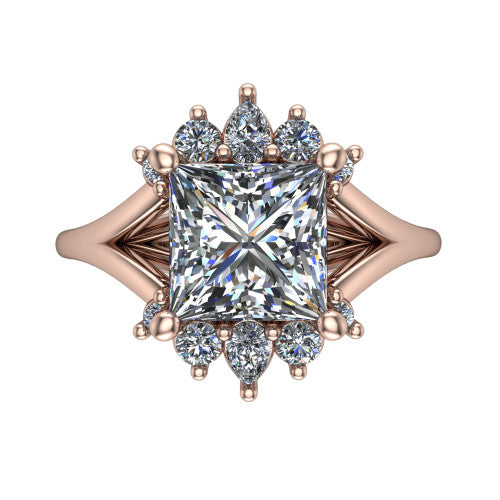 Sage princess halo engagement ring in 14K Rose Gold, top-down view showing the center diamond ringed by a ballerina halo of pear and round accent diamonds