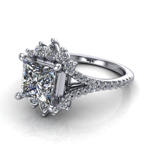 Sienna princess halo engagement ring in Platinum, three-quarter perspective showing the center framed by a vintage cluster halo of pear and round diamonds above a pav&eacute; split shank