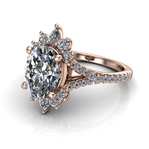 Sienna oval halo engagement ring in 18K Rose Gold, three-quarter perspective showing the center framed by a vintage cluster halo of pear and round diamonds above a pav&eacute; split shank