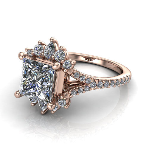 Sienna princess halo engagement ring in 14K Rose Gold, three-quarter perspective showing the center framed by a vintage cluster halo of pear and round diamonds above a pav&eacute; split shank