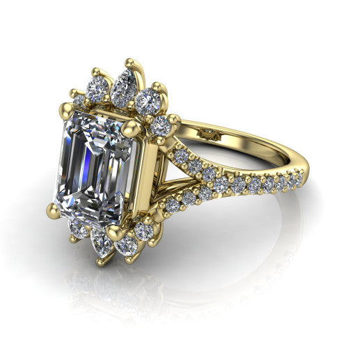 Sienna emerald halo engagement ring in 14K Yellow Gold, three-quarter perspective showing the center framed by a vintage cluster halo of pear and round diamonds above a pav&eacute; split shank