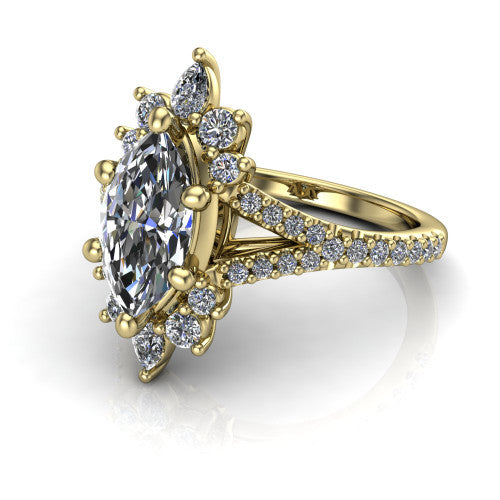Sienna marquise halo engagement ring in 18K Yellow Gold, three-quarter perspective showing the center framed by a vintage cluster halo of pear and round diamonds above a pav&eacute; split shank