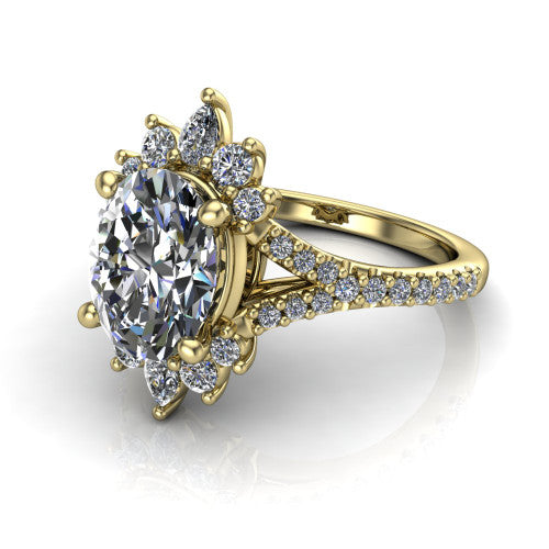 Sienna oval halo engagement ring in 14K Yellow Gold, three-quarter perspective showing the center framed by a vintage cluster halo of pear and round diamonds above a pav&eacute; split shank