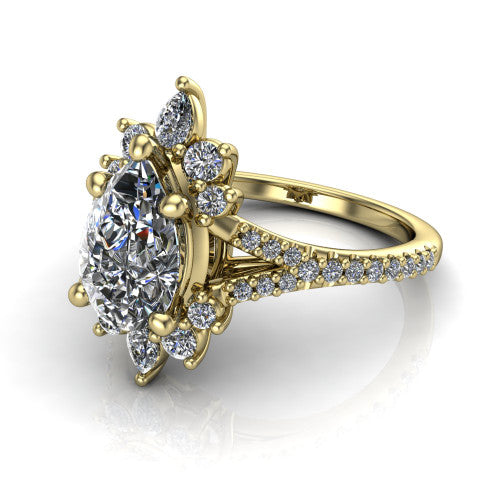 Sienna pear halo engagement ring in 18K Yellow Gold, three-quarter perspective showing the center framed by a vintage cluster halo of pear and round diamonds above a pav&eacute; split shank
