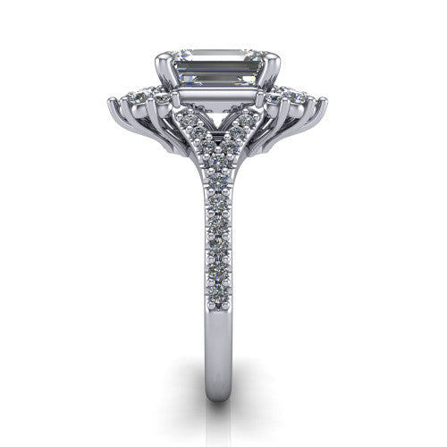 Sienna emerald halo engagement ring in Platinum, side profile showing the pear and round accent cluster and the pav&eacute; split shank