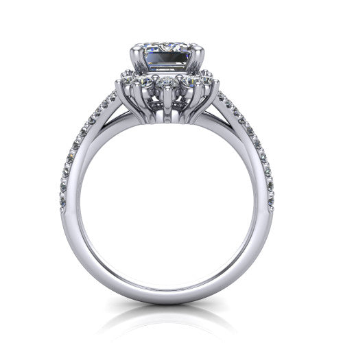Sienna emerald halo engagement ring in Platinum, through-finger front profile showing the cluster halo head raised above the pav&eacute; split band