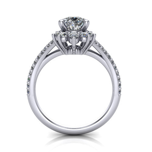 Sienna pear halo engagement ring in Platinum, through-finger front profile showing the cluster halo head raised above the pav&eacute; split band