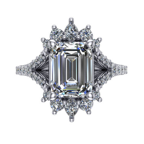 Sienna emerald halo engagement ring in Platinum, top-down view showing the center diamond ringed by a starburst ballerina halo of pear and round accent diamonds