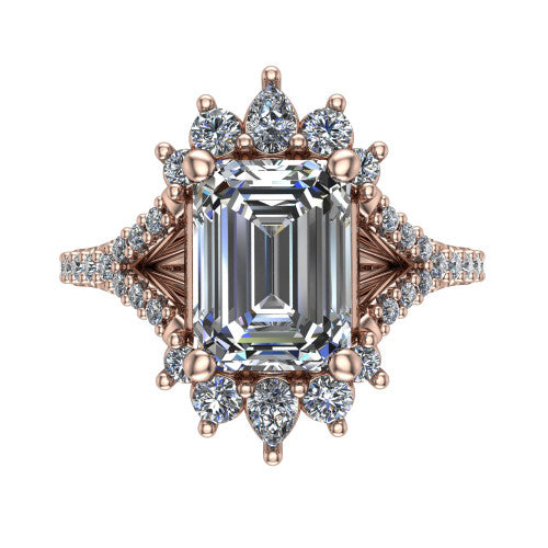 Sienna emerald halo engagement ring in 14K Rose Gold, top-down view showing the center diamond ringed by a starburst ballerina halo of pear and round accent diamonds