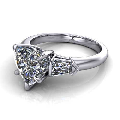 Gracie heart three stone engagement ring in Platinum, three-quarter perspective showing the heart center diamond between tapered baguette side stones
