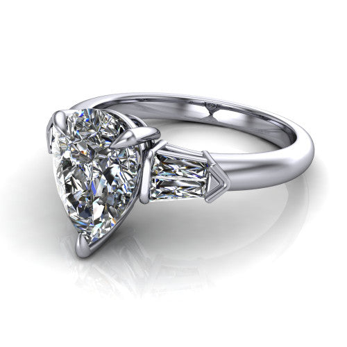 Gracie pear three stone engagement ring in Platinum, three-quarter perspective showing the pear center diamond between tapered baguette side stones