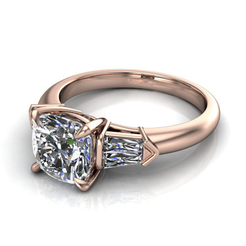 Gracie cushion three stone engagement ring in 18K Rose Gold, three-quarter perspective showing the cushion center diamond between tapered baguette side stones